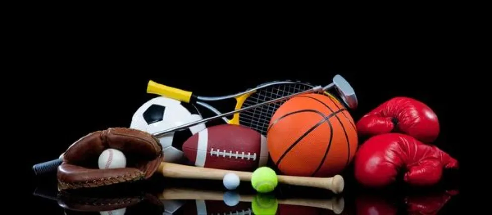 depositphotos_13409056-stock-photo-assorted-sports-equipment-on-black